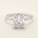 14k solid gold chunky solitaire engagement ring with an oval moissanite center stone. Modern and timeless design.