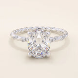 14k solid gold chunky solitaire engagement ring with an oval moissanite center stone. Modern and timeless design.