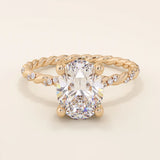 14k solid gold chunky solitaire engagement ring with an oval moissanite center stone. Modern and timeless design.