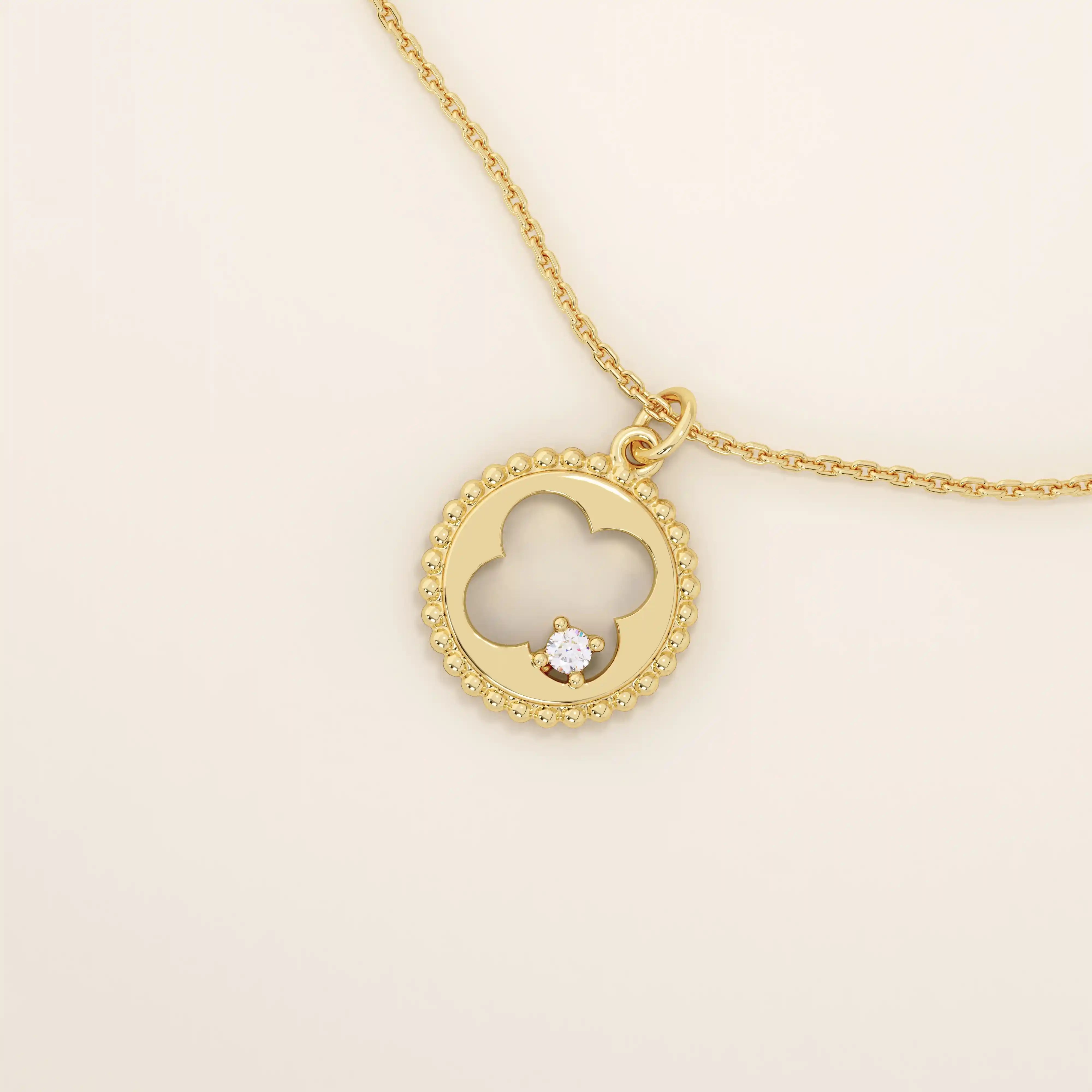 14k solid gold circle pendant necklace featuring a clover-shaped cutout and a single sparkling moissanite. Symbolic and delicate design.
