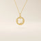 14k solid gold circle pendant necklace featuring a clover-shaped cutout and a single sparkling moissanite. Symbolic and delicate design.