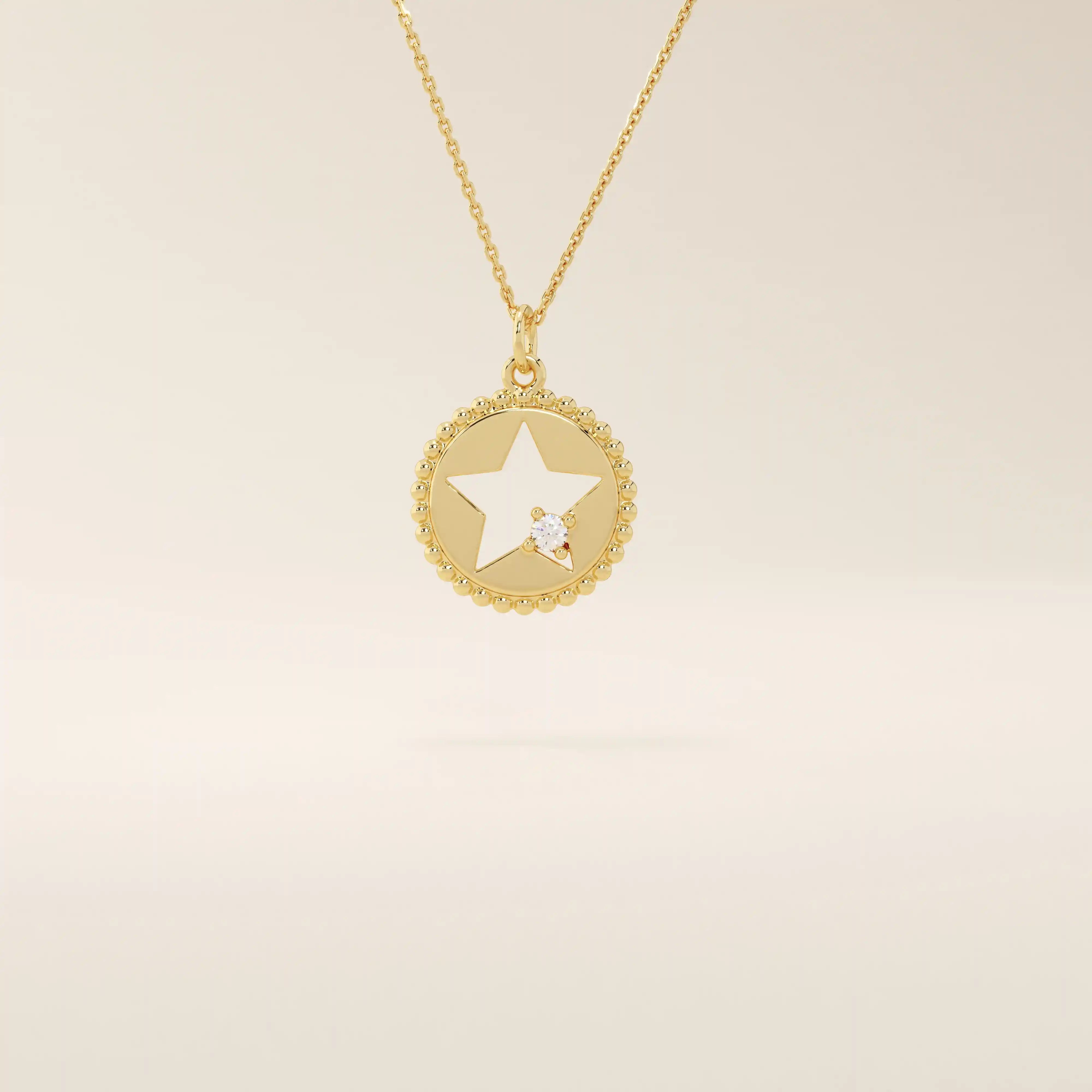 14k solid gold circle pendant necklace featuring a star-shaped cutout and a single sparkling moissanite. Delicate and celestial-inspired design.