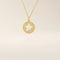 14k solid gold circle pendant necklace featuring a star-shaped cutout and a single sparkling moissanite. Delicate and celestial-inspired design.