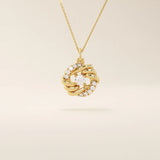 14k solid gold circle pendant with unique shape and paved moissanite stones. Eye-catching and modern gold jewelry. Ideal for minimal yet bold styling.