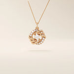 14k solid gold circle pendant with unique shape and paved moissanite stones. Eye-catching and modern gold jewelry. Ideal for minimal yet bold styling.