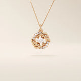 14k solid gold circle pendant with unique shape and paved moissanite stones. Eye-catching and modern gold jewelry. Ideal for minimal yet bold styling.