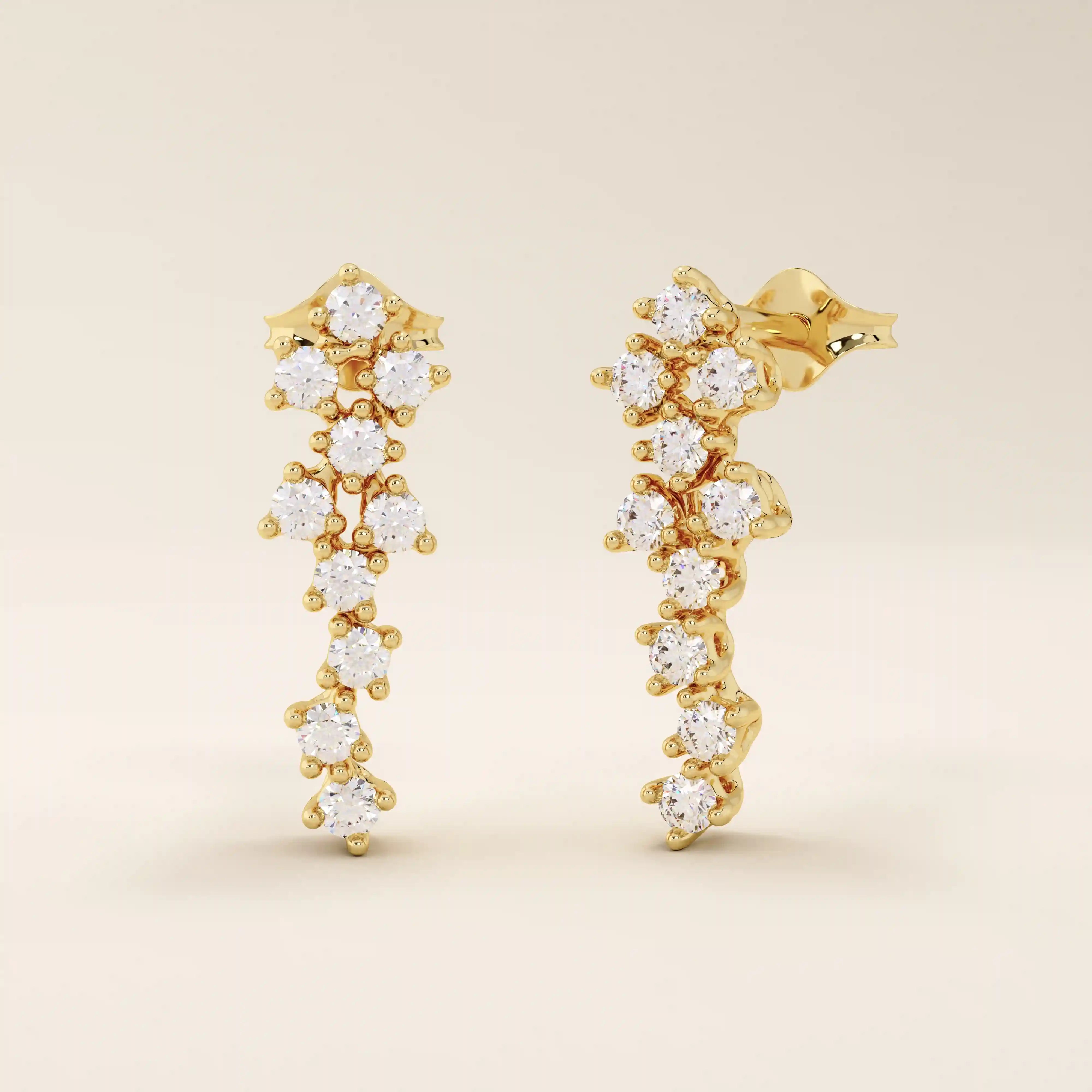 14k solid gold cluster stud earrings with tiny moissanite stones arranged in a soft, organic shape. Delicate and sparkling studs. Ideal for everyday wear or gifting.