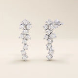 14k solid gold cluster stud earrings with tiny moissanite stones arranged in a soft, organic shape. Delicate and sparkling studs. Ideal for everyday wear or gifting.