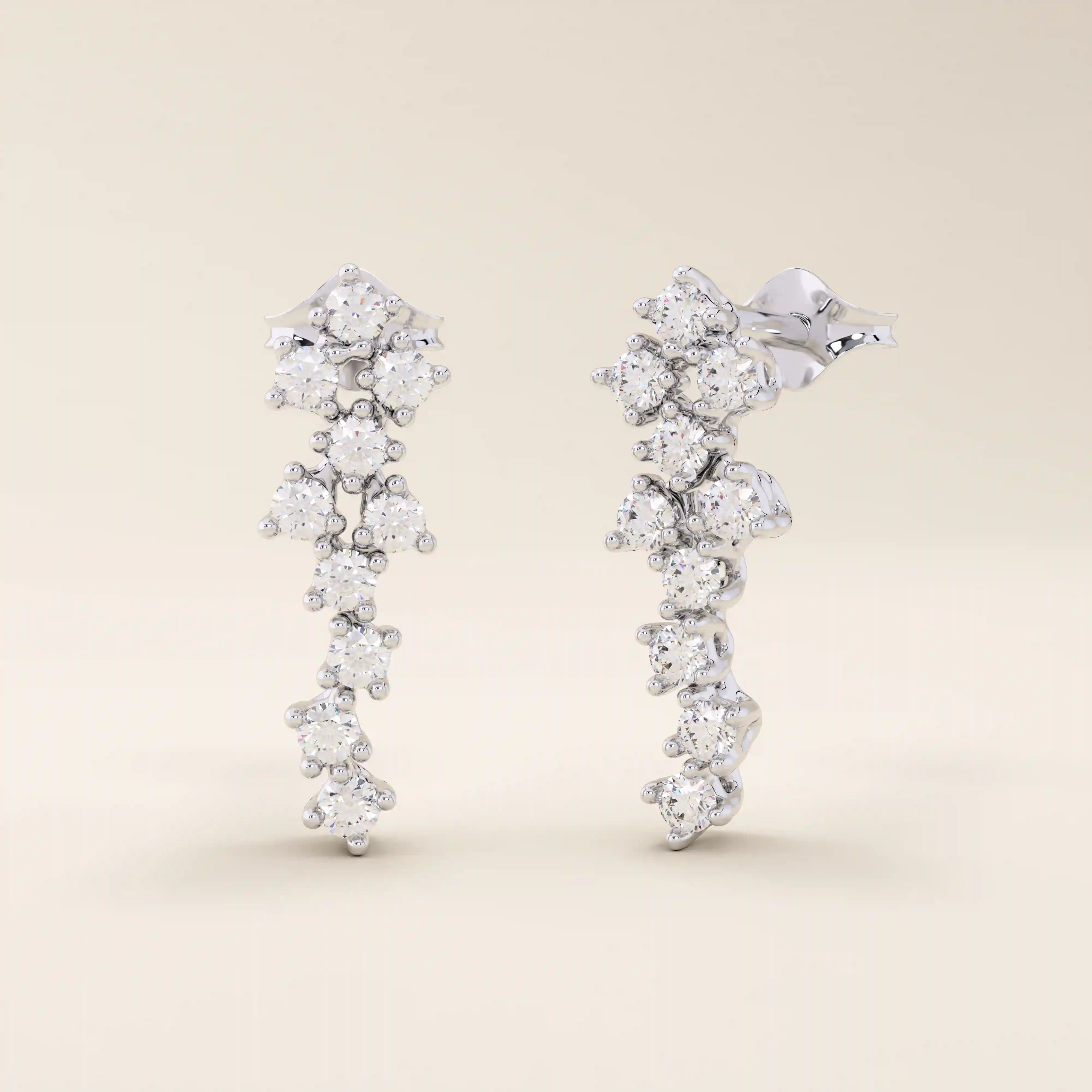 14k solid gold cluster stud earrings with tiny moissanite stones arranged in a soft, organic shape. Delicate and sparkling studs. Ideal for everyday wear or gifting.