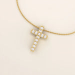 14k solid gold cross necklace with front and back pave moissanite detailing. Reversible and minimalist gold necklace design. Perfect for daily or layered styling.