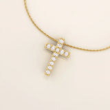 14k solid gold cross necklace with front and back pave moissanite detailing. Reversible and minimalist gold necklace design. Perfect for daily or layered styling.