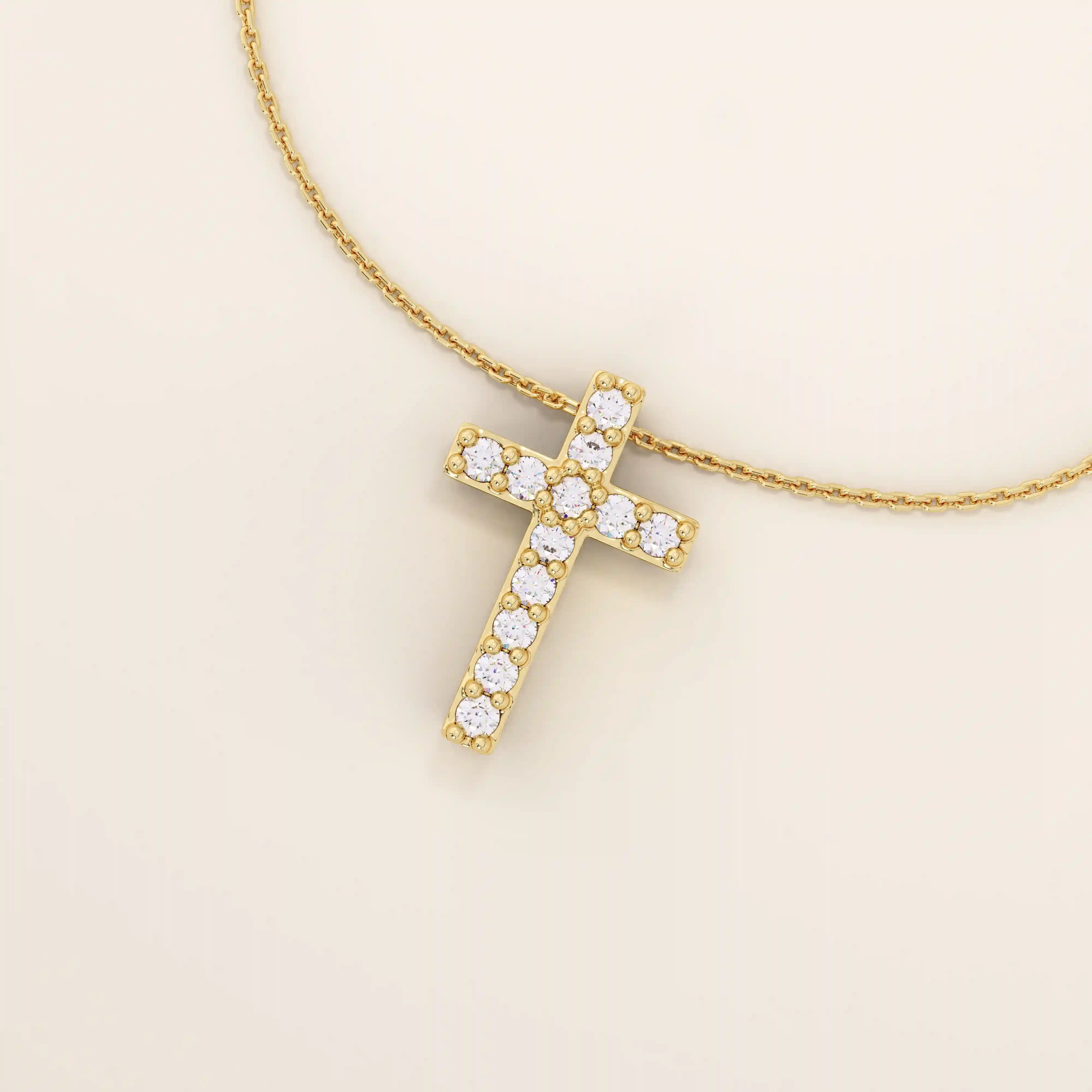 14k solid gold cross necklace with front and back pave moissanite detailing. Reversible and minimalist gold necklace design. Perfect for daily or layered styling.
