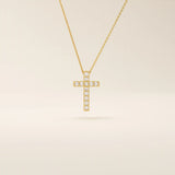 14k solid gold cross necklace with front and back pave moissanite detailing. Reversible and minimalist gold necklace design. Perfect for daily or layered styling.