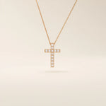 14k solid gold cross necklace with front and back pave moissanite detailing. Reversible and minimalist gold necklace design. Perfect for daily or layered styling.