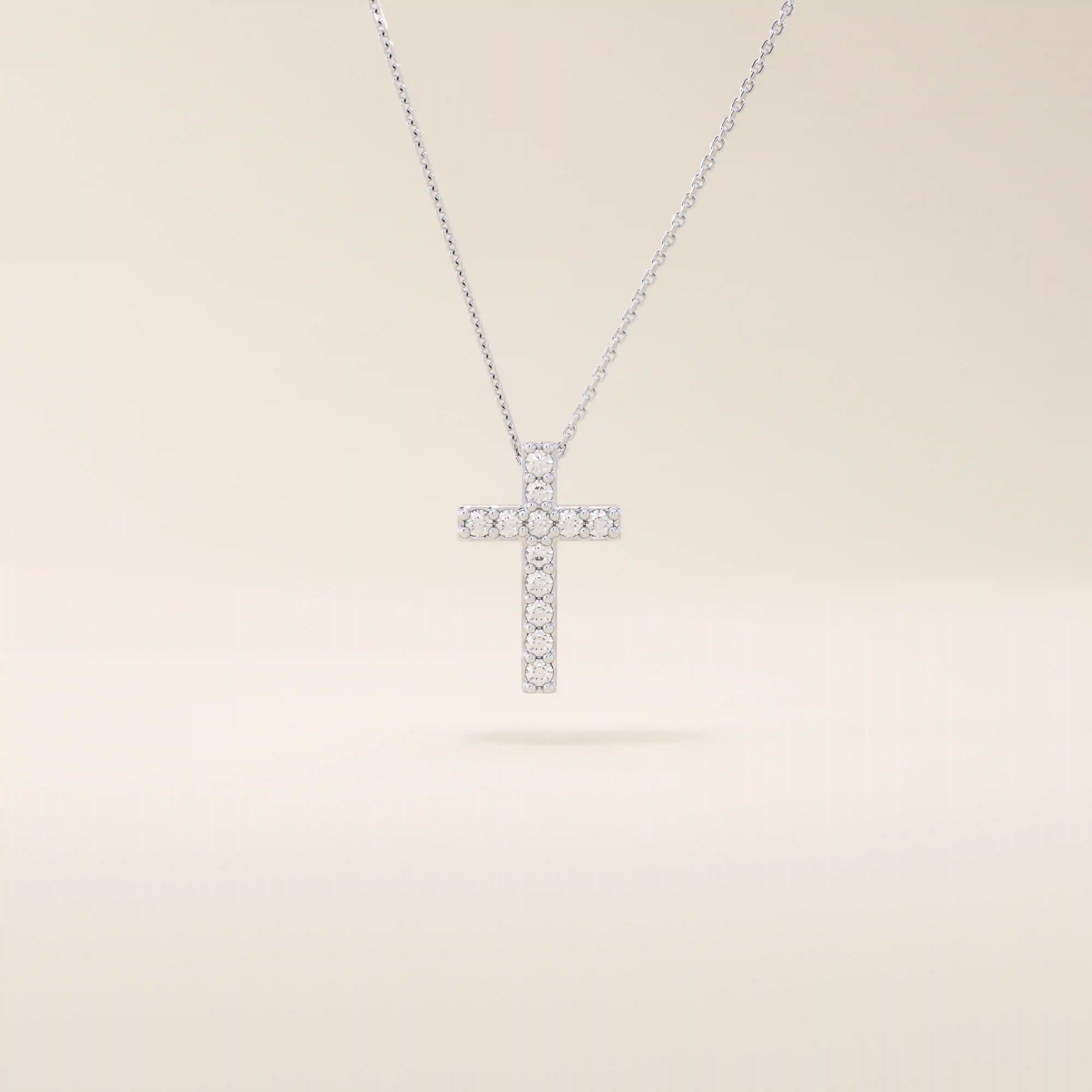 14k solid gold cross necklace with front and back pave moissanite detailing. Reversible and minimalist gold necklace design. Perfect for daily or layered styling.