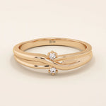14k solid gold crossover band promise ring accented with tiny sparkling moissanites. Elegant design perfect for everyday wear or gifting.