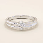14k solid gold crossover band promise ring accented with tiny sparkling moissanites. Elegant design perfect for everyday wear or gifting.