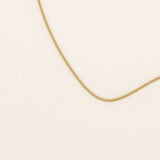 14k solid gold curb chain necklace with flat, closely interlocked links and a polished finish. A timeless and sturdy gold chain. Ideal for everyday wear or layering.