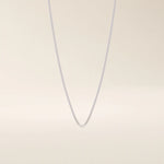 14k solid gold curb chain necklace with flat, closely interlocked links and a polished finish. A timeless and sturdy gold chain. Ideal for everyday wear or layering.