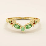 14k solid gold curve nesting ring featuring a marquise-cut emerald gemstone. Elegant and modern stacking design for women.