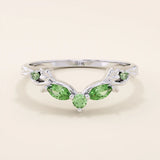 14k solid gold curve nesting ring featuring a marquise-cut emerald gemstone. Elegant and modern stacking design for women.