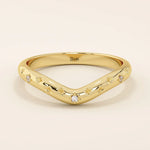 14k solid gold curved nesting ring featuring pavé moissanite star motifs. A celestial-inspired design perfect for stacking with engagement rings.