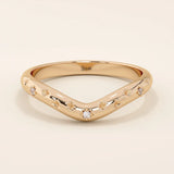 14k solid gold curved nesting ring featuring pavé moissanite star motifs. A celestial-inspired design perfect for stacking with engagement rings.