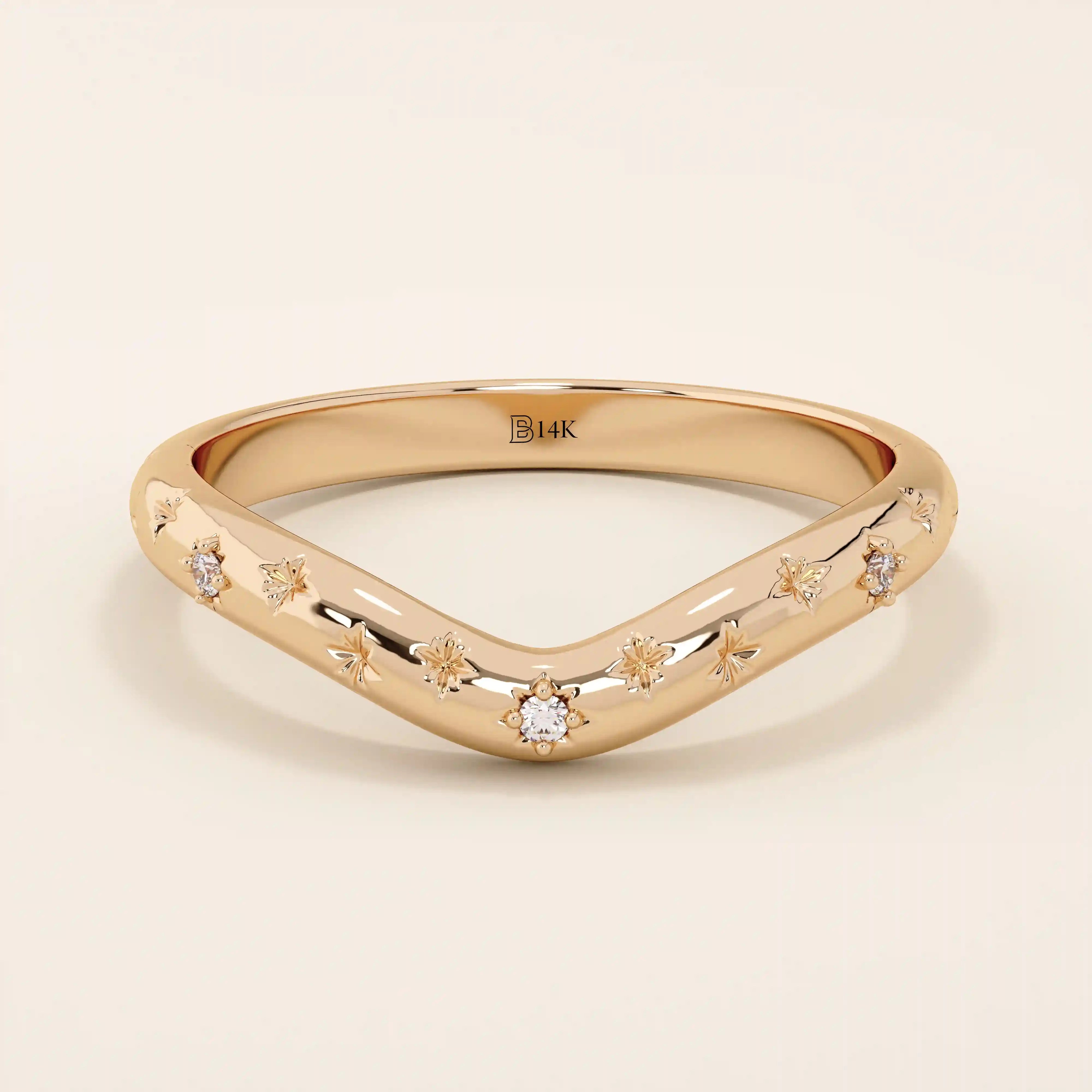 14k solid gold curved nesting ring featuring pavé moissanite star motifs. A celestial-inspired design perfect for stacking with engagement rings.