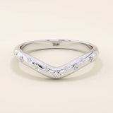 14k solid gold curved nesting ring featuring pavé moissanite star motifs. A celestial-inspired design perfect for stacking with engagement rings.