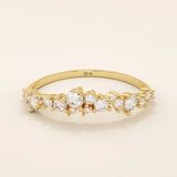 14k solid gold curved stackable wedding ring with cluster-pave moissanites. Minimalist yet sparkling design, perfect for stacking or as a wedding band.