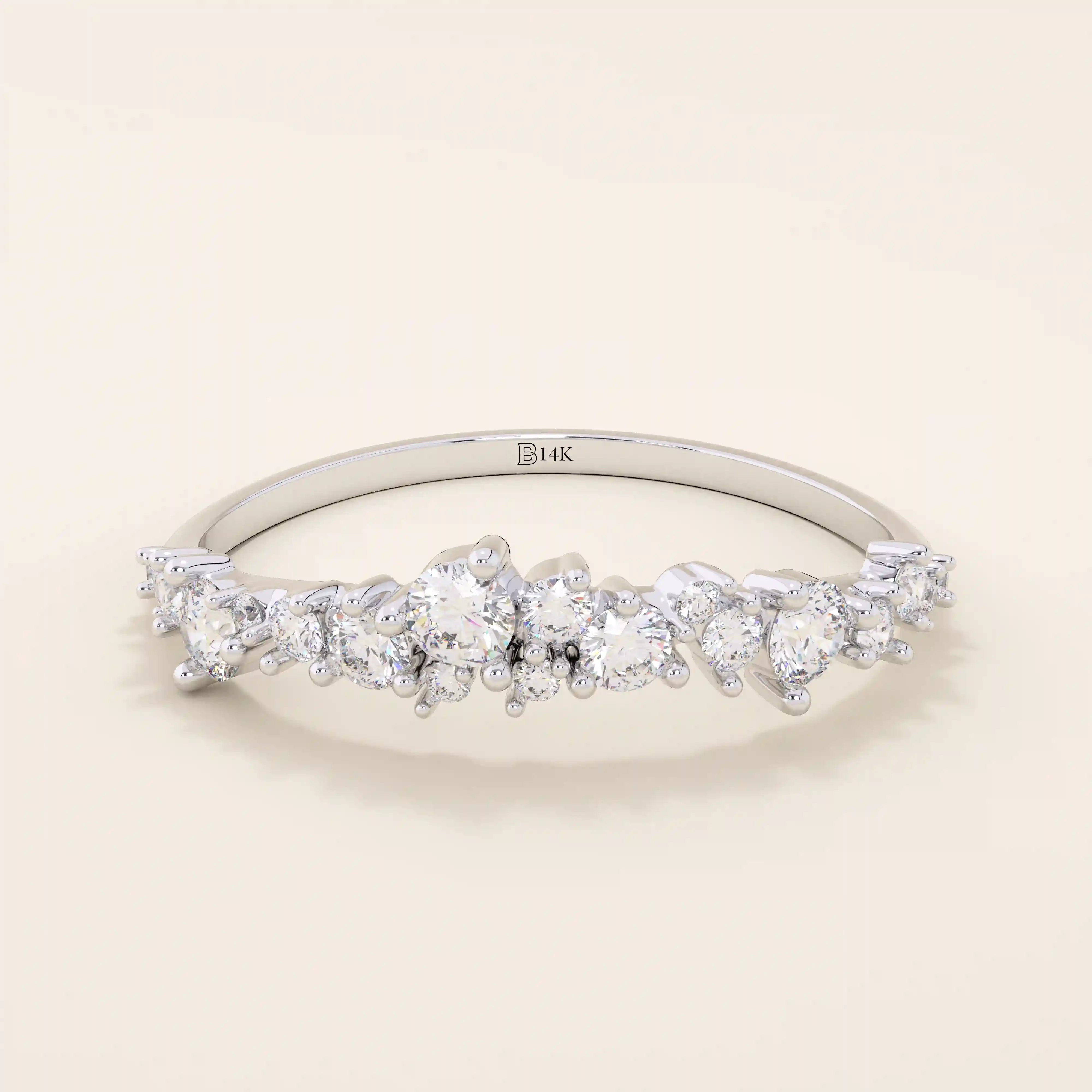 14k solid gold curved stackable wedding ring with cluster-pave moissanites. Minimalist yet sparkling design, perfect for stacking or as a wedding band.