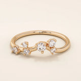 14k solid gold curved stacking ring with scattered moissanite accents. Designed to nest perfectly with solitaires or wear solo with sparkle.