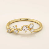14k solid gold curved stacking ring with scattered moissanite accents. Designed to nest perfectly with solitaires or wear solo with sparkle.