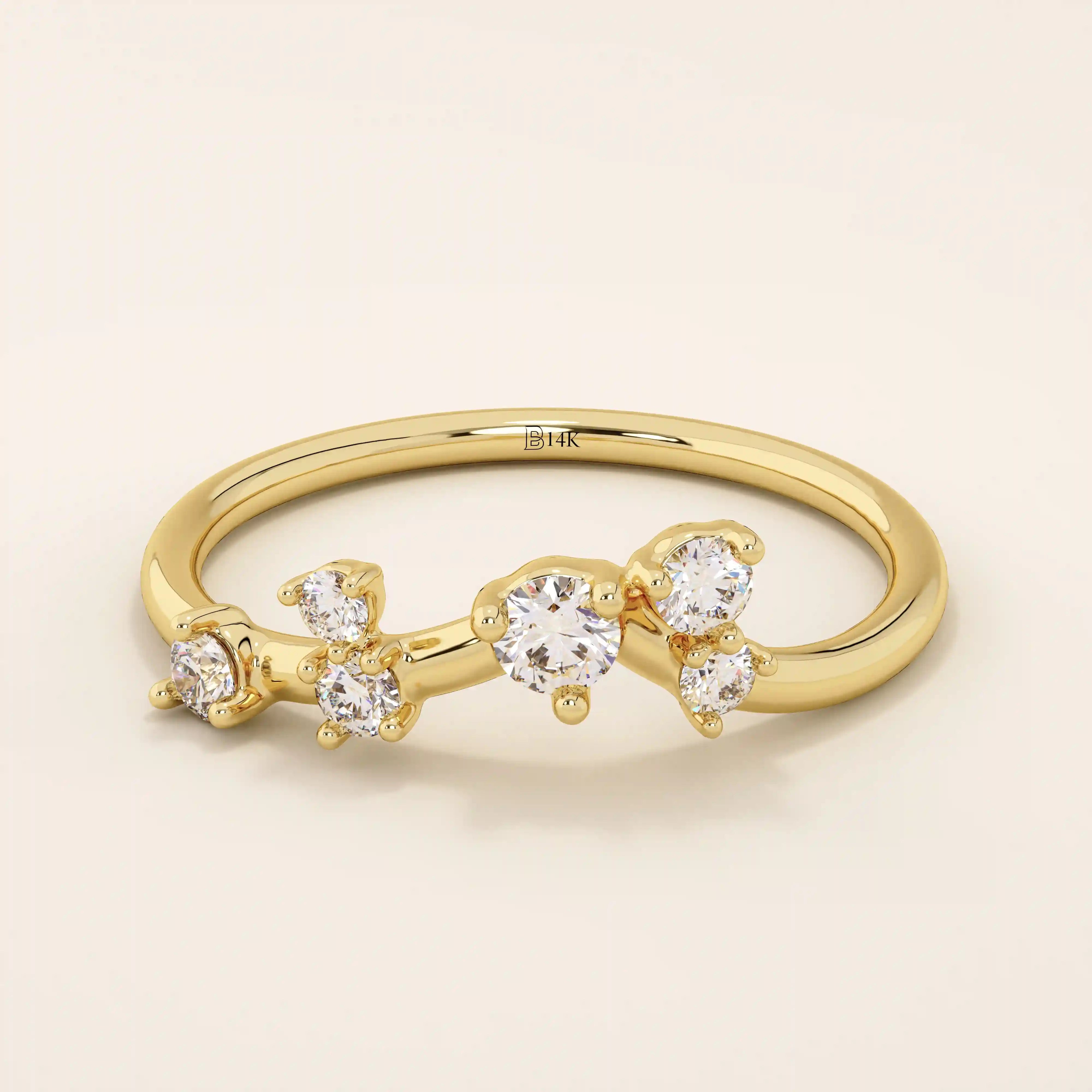 14k solid gold curved stacking ring with scattered moissanite accents. Designed to nest perfectly with solitaires or wear solo with sparkle.