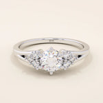 14k solid gold dainty engagement ring with a round moissanite center stone and tiny accent stones on the side. A delicate and timeless design. Perfect for minimal yet meaningful proposals.