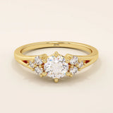 14k solid gold dainty engagement ring with a round moissanite center stone and tiny accent stones on the side. A delicate and timeless design. Perfect for minimal yet meaningful proposals.