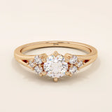 14k solid gold dainty engagement ring with a round moissanite center stone and tiny accent stones on the side. A delicate and timeless design. Perfect for minimal yet meaningful proposals.