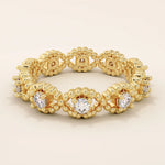 14k solid gold eternity statement ring with a beaded band and evil eye motif. Unique and protective jewelry design for women.