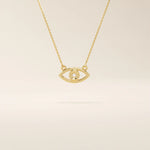 14k solid gold evil eye necklace with a minimalist eye shape and smooth polished finish. A protective and meaningful gold piece. Perfect for everyday wear or gifting.