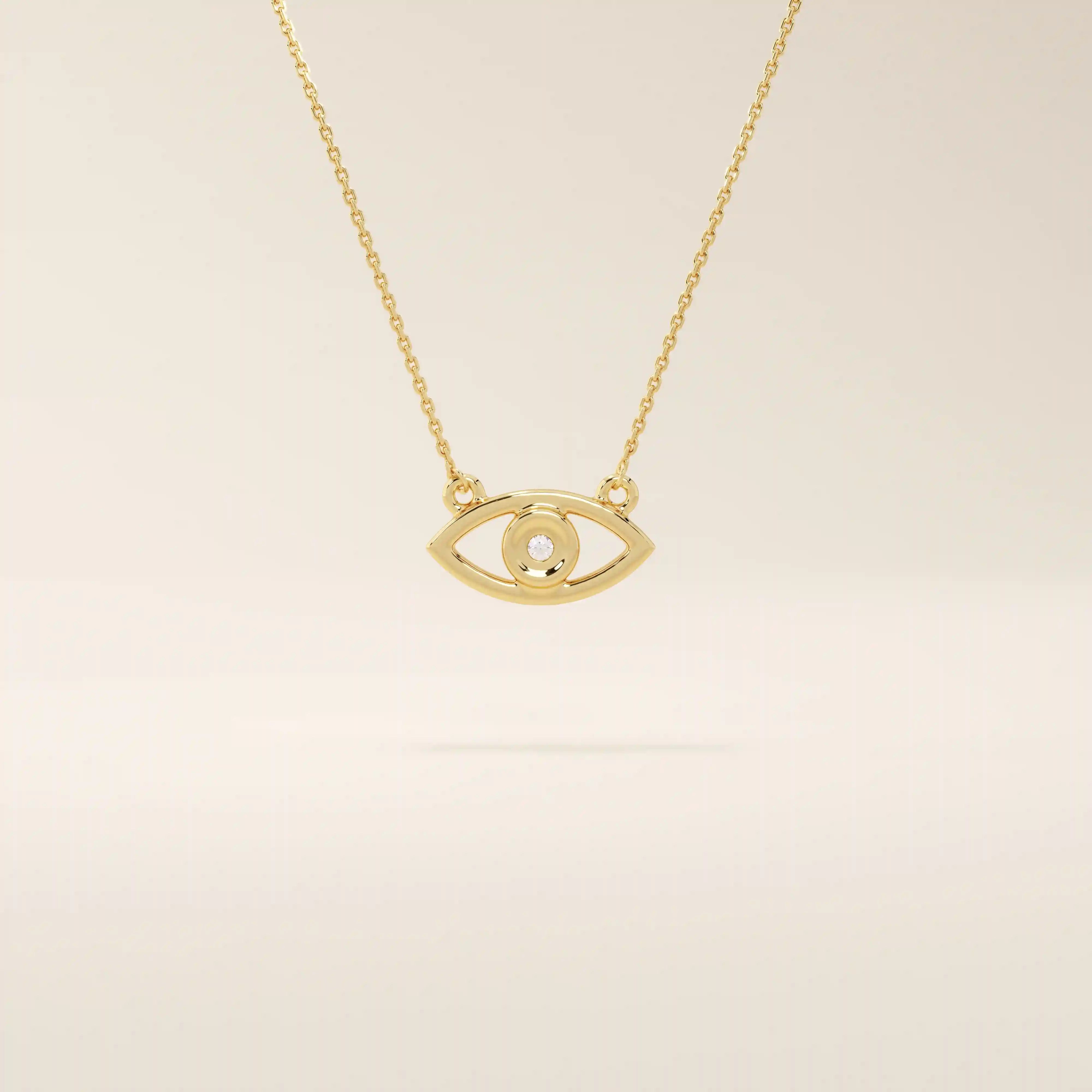 14k solid gold evil eye necklace with a minimalist eye shape and smooth polished finish. A protective and meaningful gold piece. Perfect for everyday wear or gifting.