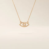 14k solid gold evil eye necklace with a minimalist eye shape and smooth polished finish. A protective and meaningful gold piece. Perfect for everyday wear or gifting.