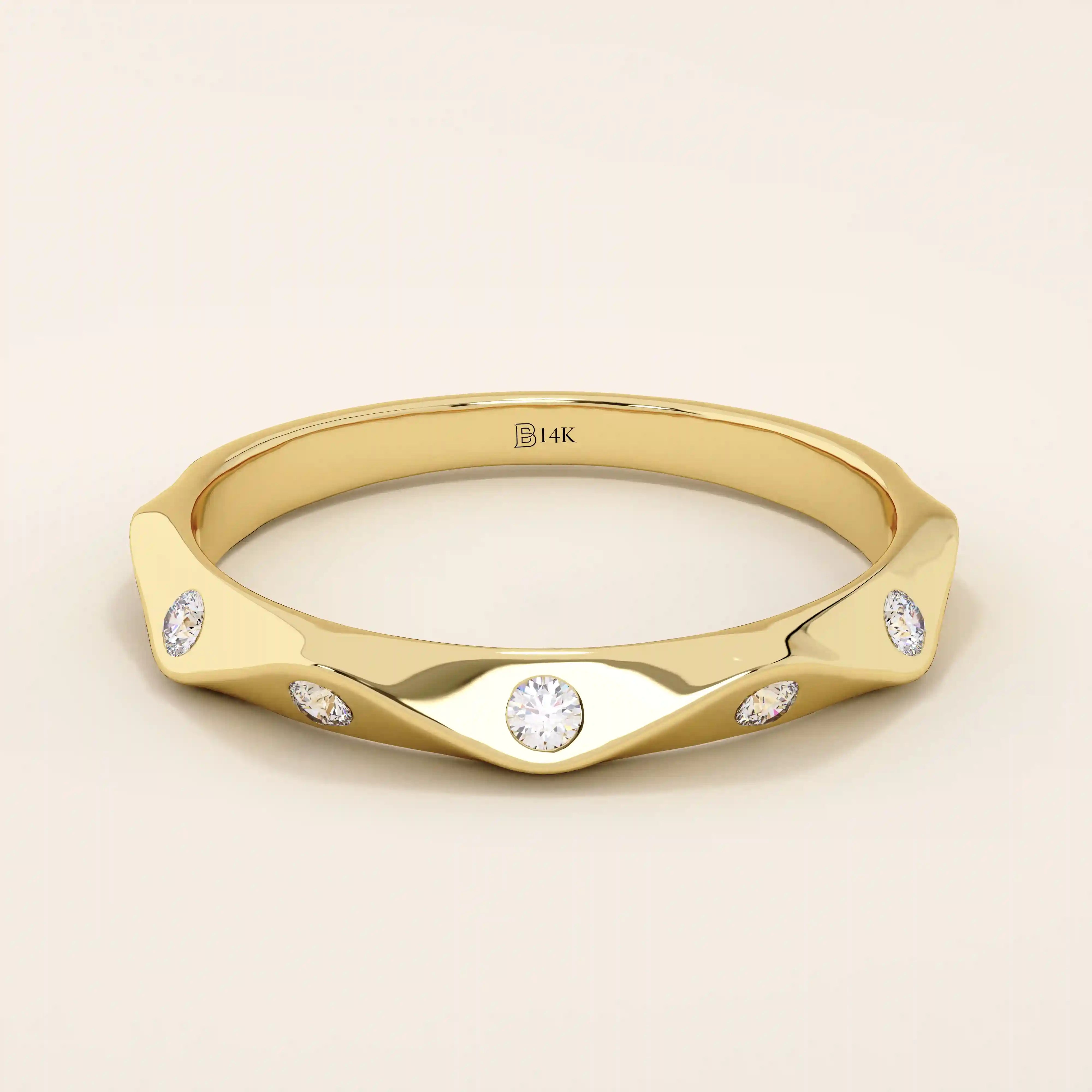 14k solid gold faceted band wedding ring adorned with tiny moissanite stones. Minimalist and sparkling design for everyday wear or stacking.