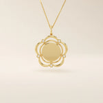 14k solid gold flower-shaped pendant necklace with a smooth, plain surface perfect for engraving. Minimalist and customizable everyday jewelry.