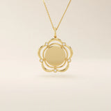 14k solid gold flower-shaped pendant necklace with a smooth, plain surface perfect for engraving. Minimalist and customizable everyday jewelry.