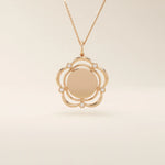 14k solid gold flower-shaped pendant necklace with a smooth, plain surface perfect for engraving. Minimalist and customizable everyday jewelry.