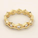 14k solid gold geometric eternity band ring featuring rhombus shapes adorned with sparkling moissanites. Bold and modern design.
