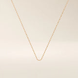 14k solid gold lip chain necklace with a soft curved link design. A unique and modern gold chain. Great for layering or wearing every day.