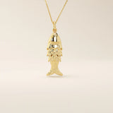 14k solid gold necklace featuring a minimalist fish design. Symbolic and playful gold jewelry. Ideal for everyday wear or gifting.