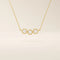 14k solid gold necklace featuring three bezel-set moissanite stones. A minimalist and stackable design perfect for layering everyday jewelry.