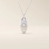 14k solid gold oval celestial pendant necklace featuring a sparkling moissanite Northstar design. Elegant and symbolic jewelry piece.